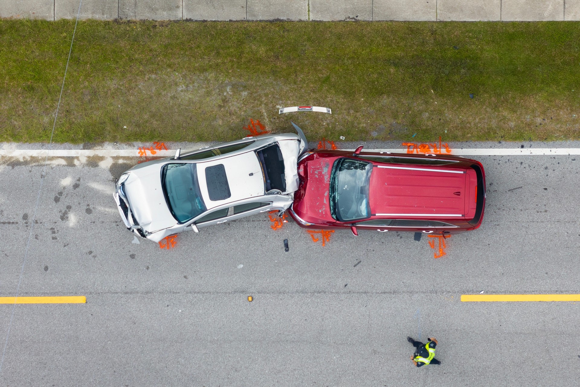 Car crash with two vehicles collided at traffic accident site on American street